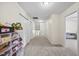Upstairs hallway offers access to various rooms and extra storage space at 2429 Follow Me Way, Raleigh, NC 27610