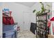 Cozy laundry room with tile floor, utility sink, and shelving perfect for organizing at 2429 Follow Me Way, Raleigh, NC 27610