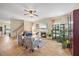 Cozy living room with hardwood floors, a fireplace, a flatscreen, and comfortable seating arrangement at 2429 Follow Me Way, Raleigh, NC 27610