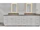 Bathroom featuring double vanities with grey counters and striking fixtures at 2615 Bedford Ave, Raleigh, NC 27607