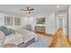 Bedroom with hardwood floors, a ceiling fan, and a television at 2615 Bedford Ave, Raleigh, NC 27607