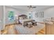 Bedroom with hardwood floors, a ceiling fan and windows at 2615 Bedford Ave, Raleigh, NC 27607