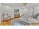 Bedroom featuring light wood floors and comfortable armchair at 2615 Bedford Ave, Raleigh, NC 27607