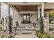 Inviting front porch with stone accents, double doors, and a covered entryway at 2615 Bedford Ave, Raleigh, NC 27607