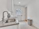 Laundry room featuring a large sink, washer, and dryer at 2615 Bedford Ave, Raleigh, NC 27607