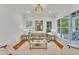 Cozy living room with ample natural light, hardwood floors, and neutral decor at 2615 Bedford Ave, Raleigh, NC 27607