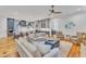 Open-concept living room flows into a modern kitchen with island seating and hardwood floors at 2615 Bedford Ave, Raleigh, NC 27607