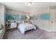 Charming bedroom with stylish decor, comfortable bed, and workspace by the window at 269 Ivy Ridge Rd, Chapel Hill, NC 27516