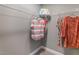 Spacious walk-in closet with ample shelving, rods, and neutral decor at 269 Ivy Ridge Rd, Chapel Hill, NC 27516