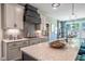 Well-appointed kitchen showcases granite countertops, a gas range, and sophisticated cabinetry at 269 Ivy Ridge Rd, Chapel Hill, NC 27516