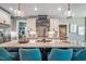 Contemporary kitchen features an island with seating, stylish pendant lights, and ample storage at 269 Ivy Ridge Rd, Chapel Hill, NC 27516