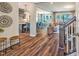 Open-concept living space showcasing hardwood floors, a kitchen island, and a seamless flow for modern living at 269 Ivy Ridge Rd, Chapel Hill, NC 27516