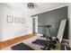 Home gym with hardwood floors and basic exercise equipment for convenient workouts at 2702 Richwood Rd, Durham, NC 27705
