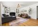 Bright living room features a black fireplace, built-in shelves, and a comfortable seating arrangement at 2702 Richwood Rd, Durham, NC 27705