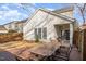 Exterior home image showcasing a spacious wooden deck and covered patio with sliding doors at 2728 Cherry Field Dr, Raleigh, NC 27603