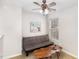 Inviting living room featuring a futon and unique, multi-tiered side tables at 2728 Cherry Field Dr, Raleigh, NC 27603