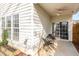 Outdoor patio featuring a ceiling fan and a dining set at 2728 Cherry Field Dr, Raleigh, NC 27603