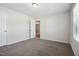 Bedroom featuring neutral paint, carpeted floors, and a view from the window at 2800 Elsa Dr, Raleigh, NC 27610