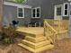 Outdoor living on this back deck with built in stairs and railing, plus a charcoal grill, perfect for relaxing! at 2811 Van Dyke Ave, Raleigh, NC 27607