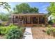 Inviting home with a covered porch, attractive landscaping, and a walkway leading to the front door at 2811 Van Dyke Ave, Raleigh, NC 27607