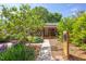 A charming home with lush landscaping, a stone walkway, and a cozy front porch at 2811 Van Dyke Ave, Raleigh, NC 27607