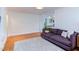 Inviting living room with hardwood floors, neutral tones, and a comfortable sofa at 2811 Van Dyke Ave, Raleigh, NC 27607
