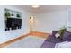 Inviting living room features hardwood floors, built-in shelving, and a cozy sitting area, perfect for relaxation at 2811 Van Dyke Ave, Raleigh, NC 27607