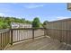 Wooden balcony overlooking the community and green trees at 2821 Wilshire Hill Dr # 111, Raleigh, NC 27604