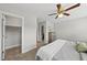 Bedroom with open closet space and adjacent bathroom at 2821 Wilshire Hill Dr # 111, Raleigh, NC 27604