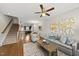 Inviting living room with hardwood floors, a decorative rug, and an open floor plan concept at 2821 Wilshire Hill Dr # 111, Raleigh, NC 27604