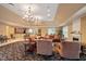 The well-appointed lounge with fireplace, comfortable seating, and nearby refreshment area at 2821 Wilshire Hill Dr # 111, Raleigh, NC 27604