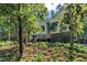 Charming home exterior with a spacious porch and lush foliage, nestled in a private setting at 2901 Horse Shoe Farm Rd, Wake Forest, NC 27587