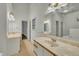 Bright bathroom featuring double sinks, ample vanity space, and neutral color palette at 2901 Horse Shoe Farm Rd, Wake Forest, NC 27587