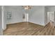 Large bedroom with wood floors, neutral walls, and natural light from windows at 2901 Horse Shoe Farm Rd, Wake Forest, NC 27587