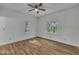 Bright bedroom featuring wood flooring, natural light, and a neutral color palette at 2901 Horse Shoe Farm Rd, Wake Forest, NC 27587