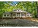 Classic brick and white home with a symmetrical facade and inviting entrance at 2901 Horse Shoe Farm Rd, Wake Forest, NC 27587