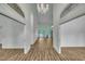 Spacious foyer with hardwood floors and large doorways leading to other rooms at 2901 Horse Shoe Farm Rd, Wake Forest, NC 27587