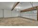 Spacious two car garage featuring concrete flooring and a garage door at 2901 Horse Shoe Farm Rd, Wake Forest, NC 27587