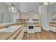 Functional kitchen featuring white appliances, light wood countertops, and hardwood floors, offering an efficient cooking space at 2901 Horse Shoe Farm Rd, Wake Forest, NC 27587