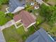Birds-eye view of the home highlighting the backyard with a brick patio and fire pit at 308 Holly Briar Dr, Fuquay Varina, NC 27526