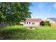 Backyard featuring brick patio and fire pit at 308 Holly Briar Dr, Fuquay Varina, NC 27526