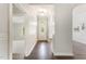Inviting foyer features hardwood floors, arched doorways, and a view of a room filled with natural light at 315 Copper Ridge Dr, Sanford, NC 27330