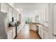 Bright and spacious kitchen with white cabinets, granite countertops, and stainless steel appliances at 315 Copper Ridge Dr, Sanford, NC 27330