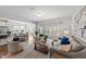 Spacious and bright living room featuring hardwood floors and ample natural light at 316 Barley Mill Rd, Holly Springs, NC 27540