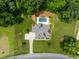 Beautiful aerial view of home with an in-ground pool and surrounding greenery at 325 Forest Bridge Rd, Youngsville, NC 27596