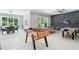 Spacious finished basement with foosball, ping pong, and air hockey for game nights at 325 Forest Bridge Rd, Youngsville, NC 27596