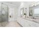 Bright bathroom with glass shower, dual vanity, and ensuite features at 325 Forest Bridge Rd, Youngsville, NC 27596
