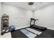 Home gym with treadmill, yoga mats, weights, and fitness equipment at 325 Forest Bridge Rd, Youngsville, NC 27596