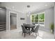 Game room with a poker table, overhead lighting, and a view of the pool at 325 Forest Bridge Rd, Youngsville, NC 27596