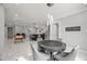 Game room features a poker table with bar access and shuffleboard nearby at 325 Forest Bridge Rd, Youngsville, NC 27596